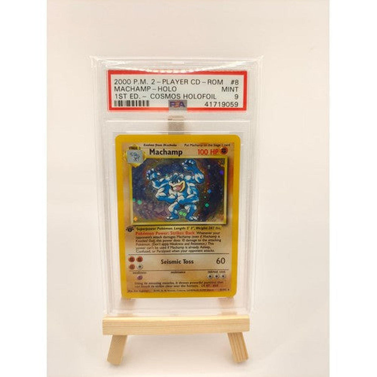 Pokémon - 1st Edition Machamp (PSA 9) COSMOS HOLOFOIL