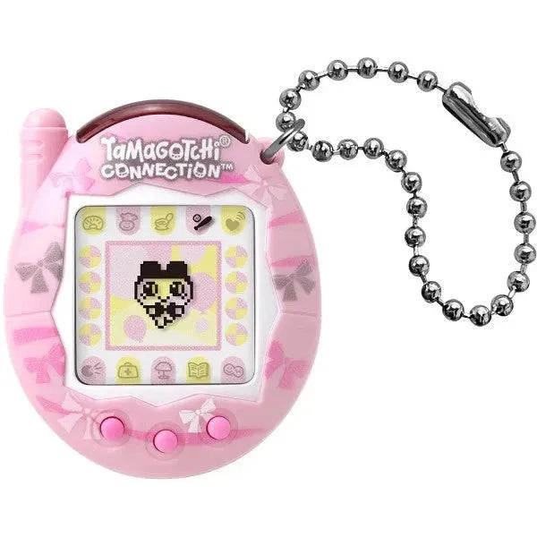 Pink Tamagotchi Connection toy with a keychain on a white background