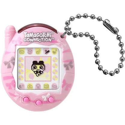 Pink Tamagotchi Connection toy with a keychain on a white background